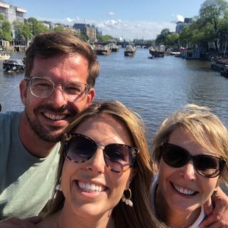 Guests with Dennis at a market in Amsterdam