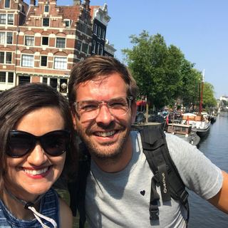 Guests with Dennis on a canal boat in Amsterdam