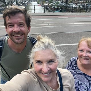 Guests with Dennis at a brown café in Amsterdam