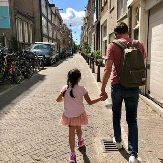 Guests cycling with Dennis through Amsterdam