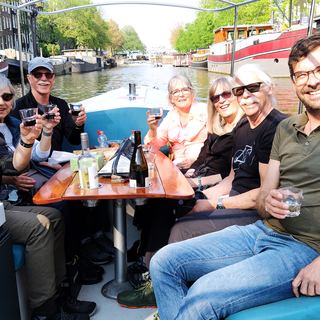 Guests with Dennis among the tulip fields outside Amsterdam