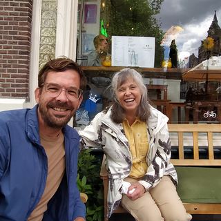 Guests with Dennis at a brown café in Amsterdam
