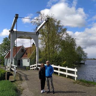 Guests with Dennis on a canal boat in Amsterdam